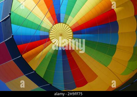 Inside of colorful hot air balloon with support cables Stock Photo