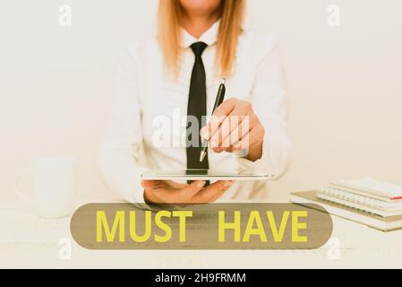 Handwriting text Must Have. Concept meaning something modern that many showing want to have Essential item Developer Discussing Gadget Upgrade Stock Photo