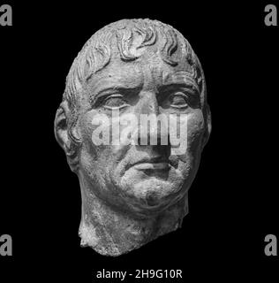 Head of noble roman statue. Ancient sculpture isolated on black background. Classic antiquity man portrait Stock Photo