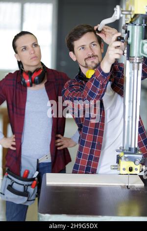 wood industry technicians working together on project Stock Photo