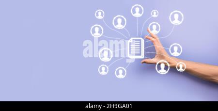 Man hold document and user icon.Corporate data management system DMS and document management system concept. Businessman click or publish on document Stock Photo