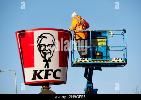 drive through KFC sign being erected at Elk Retail Park in Oldham, Greater Manchester Stock Photo