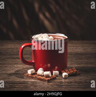 Hot chocolate with marsmallow candies and pieces of chocolate Stock Photo