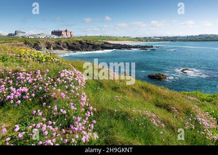 A view over a sunny Fistral Bay from Towan Head in Newquay in Cornwall. Stock Photo