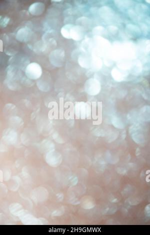 Defocus light blue glitter. Gradient transition from blue to beige abstract background. Stock Photo