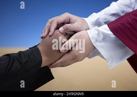 Jesus Christ gave his help to his follower with sky background Stock Photo