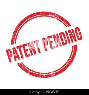 PATENT PENDING text written on red grungy vintage round stamp. Stock Photo
