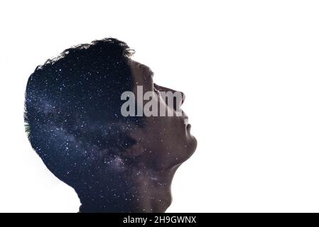 Isolated combination of the silhouette of a man face and the stars of the Milky Way. Concept of the connection between man and the universe, new disco Stock Photo