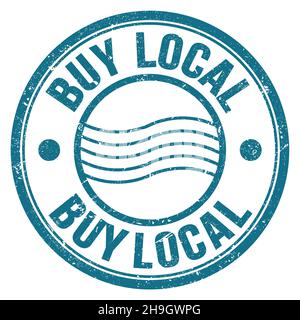 BUY LOCAL word written on blue round postal stamp sign Stock Photo