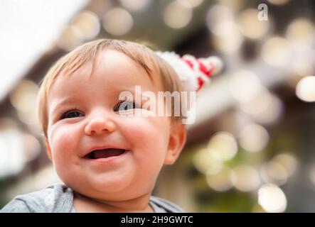 portrait of the cute baby in santa hat christmas Stock Photo