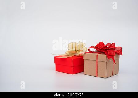 two gift boxes with bows on a white background Stock Photo