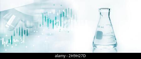 glass flask and microscope in soft white blue light medical science lab and research data information trend graph banner background Stock Photo