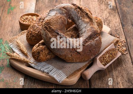 Fresh, crunchy whole grain bread close-up. Bakery products. Side view. Stock Photo