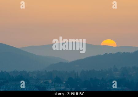 Sahara Dust Sunset as seen over the Vienna Woods from the South of Vienna, Austria Stock Photo