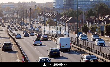 Traffic traveling on the A3 Bypass towards Tolworth South West London on a bright and dry late winters afternoon. Stock Photo