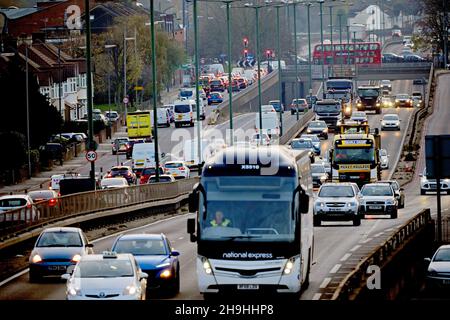 Busy Traffic on the A3 Trunk Road at dusk during an early evening commute in Greater London. Stock Photo