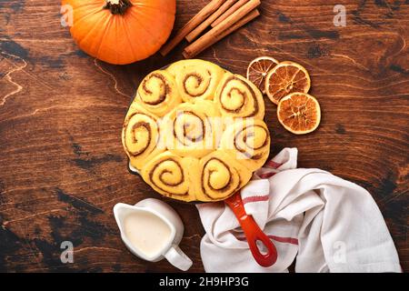 Cinnamon rolls or cinnabon homemade recipe raw dough preparation sweet traditional dessert buns pastry food baked homemade swirl Danish mini snack. Fo Stock Photo