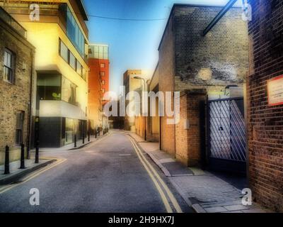 A street scene in Shoreditch London (an image processed with an app called Dynamic Light as part of a series of experimental images taken and processed on the iPhone) Stock Photo