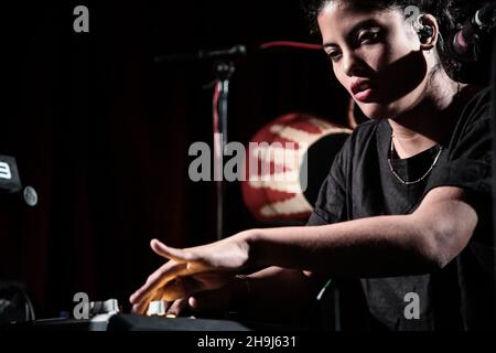 Naomi Diaz of twin-sister band Ibeyi performing live on stage at a sold