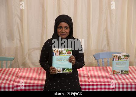 Nadiya Hussain, winner of the BBC series The Great British Bake Off, poses for photos at the Picaddilly branch of Waterstones in London before a book-signing after the announcement of the winner yesterday. Stock Photo