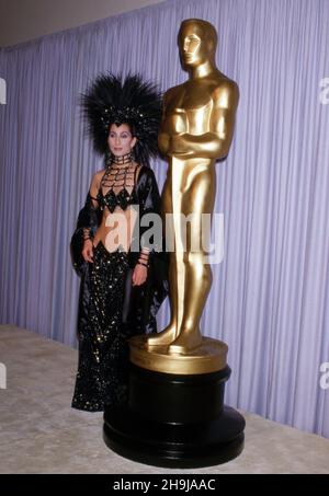 Cher at  the 58th Annual Academy Awards on March 24, 1986 at Dorothy Chandler Pavilion, Los Angeles Music Center in Los Angeles, California. . Credit: Ralph Dominguez/MediaPunch Stock Photo