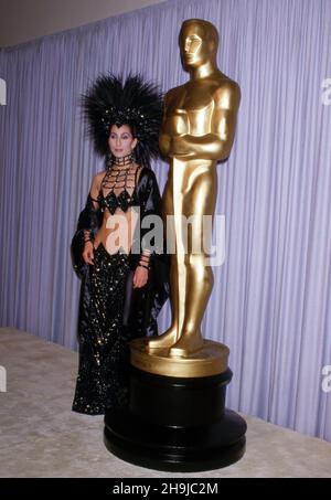 Cher at  the 58th Annual Academy Awards on March 24, 1986 at Dorothy Chandler Pavilion, Los Angeles Music Center in Los Angeles, California. . Credit: Ralph Dominguez/MediaPunch Stock Photo