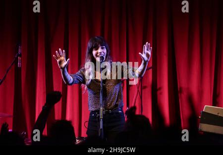 Lou Doillon, daughter of Jane Birkin and French film director Jacques Doillon and previously the face of Givenchy, performing live on stage with her band on the first date of her new tour at Bush Hall in London Stock Photo