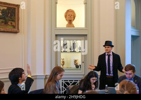 Students taking part in sessions at OxIMUN 2016 in Somerville College (with a bust of Margaret Thatcher in the background). From a series of photos taken at the Oxford International Model United Nations conference (OxIMUN 2016). Photo date: Sunday, November 13, 2016. Photo credit should read: Richard Gray/EMPICS Entertainment Stock Photo