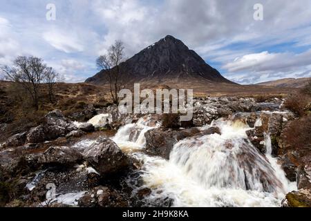 Buachaille Etive Mor and waterfall on the river coupall in glencoe Stock Photo