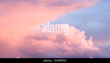 Moody sky with rain clouds at sunset, dramatic background or template Stock Photo