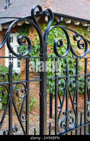 Wrought iron decorative metal gates, ornamental driveway gates, UK Stock Photo