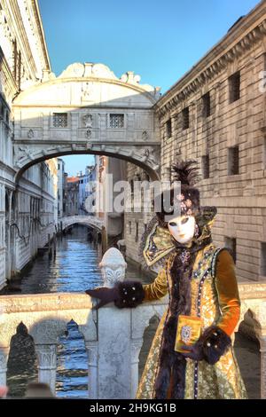Venice, Italy - February 10, 2018: Person in a traditional venetian costume attends the Carnival of Venice Stock Photo