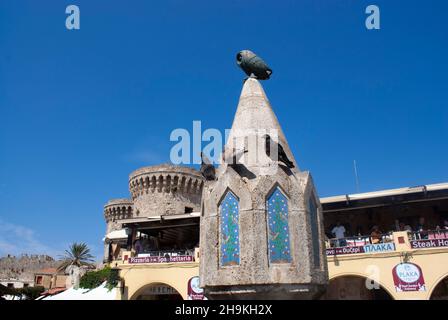 Rhodes island - Greece - September 10 2010 : Beautiful historic fountain, Hippocrates Square in the heart of the ancient city.  Landscape aspect view Stock Photo