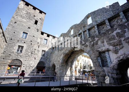 AOSTA, ITALY - AUGUST 20, 2021: roman ruins Porta Praetoria gate in Aosta city, northern Italy Stock Photo