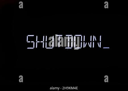 Shutdown message on an electronc screen Stock Photo