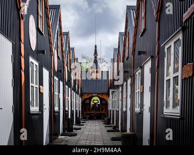 Hafnarfjordur, Iceland - July 17, 2021: Row of wooden cabins in the Viking hotel in Hafnarfjordur town. Traditional, viking style architecture. Stock Photo