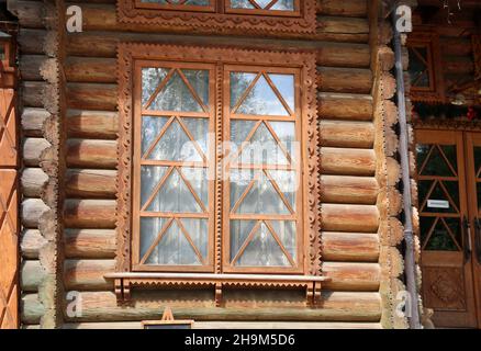 A window in a house made of logs. Stock Photo