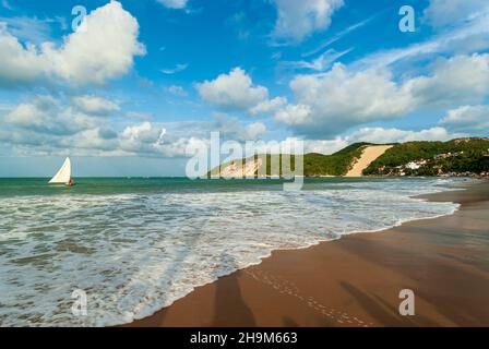 Ponta Negra beach, with Morro do Careca in the background, in the late afternoon, Natal, Rio Grande do Norte, Brazil on February 19, 2008. Stock Photo