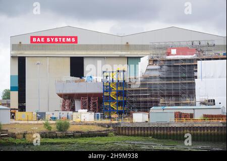 Glasgow, Scotland, UK, August 14th 2020, Shipbuilding and crane in Glasgow on the River Clyde showing ship being built in progress Stock Photo