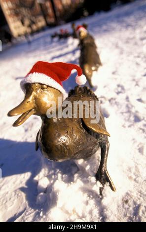 Santa Hats on the Make Way For Ducklings Statues, Boston Garden, Boston, Massachusetts, USA Stock Photo