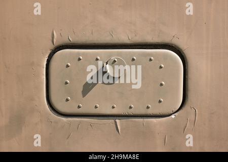 Military vehicl detail fuel tank lid rusty metal Stock Photo