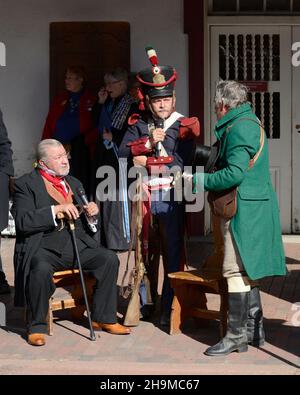 Historical reenactors in period dress present a dramatic reenactment of the 1821 opening of the Santa Fe Trail in Santa Fe, New Mexico. Stock Photo