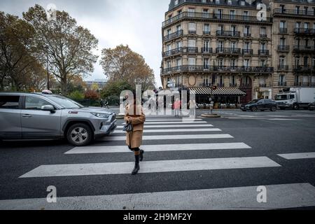 Street scene at the streets fo Paris and people walking around. Paris, France Stock Photo