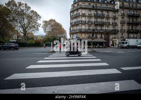 Street scene at the streets fo Paris and people walking around. Paris, France Stock Photo