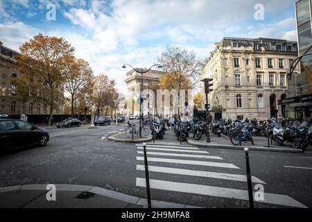 Street scene at the streets fo Paris and people walking around. Paris, France Stock Photo