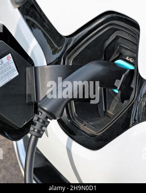 Electric Car Charging at Charging Point, United Kingdom Stock Photo