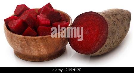 Beetroot sliced and pieces in a bowl over white Stock Photo