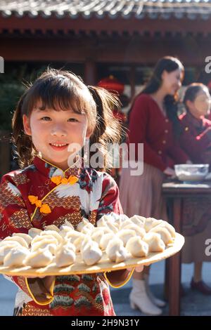 Happy home New Year pack dumpling Stock Photo