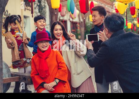 Temple fairs to pose for photos of family of six Stock Photo