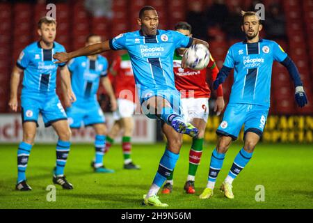 Ludwig Francillette (Crawley no. 15 ) clears the ball during the Sky Bet League 2 match between Walsall and Crawley Town at the Banks's Stadium, Walsall, England on 7 December 2021. Photo by Karl Newton/PRiME Media Images. Credit: PRiME Media Images/Alamy Live News Stock Photo